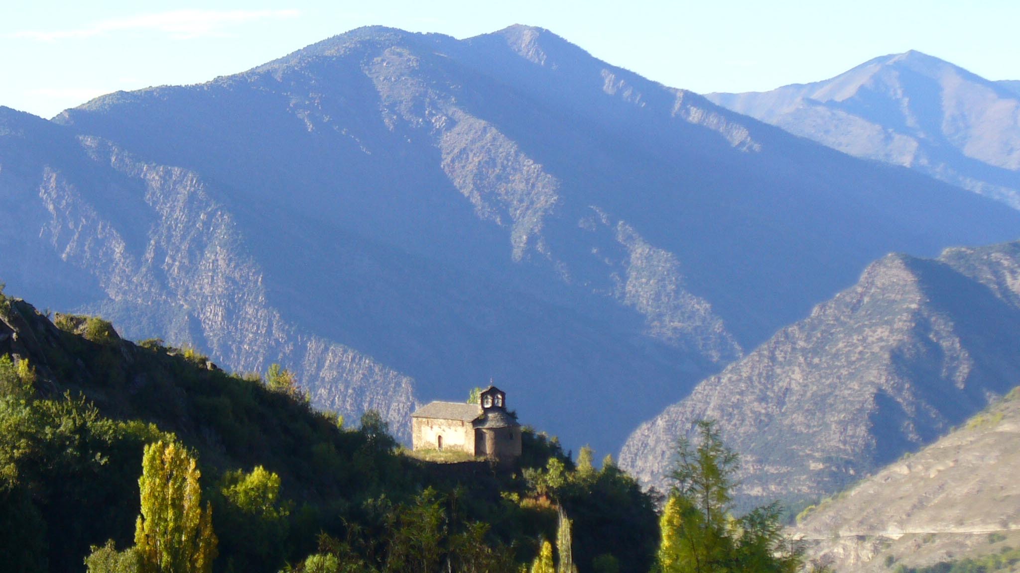 View of the Hermitage of Santa Eulalia d’Alendo from the Centre d’Art i Natura, Farrera, Catalan Pyrenees.